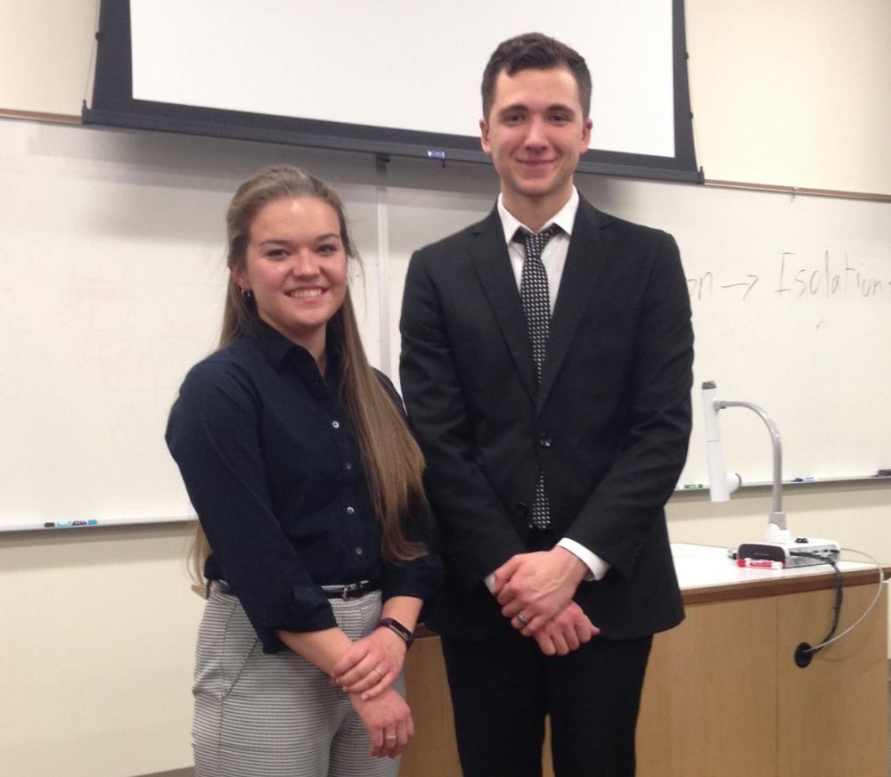 Emily David and Daniel Caylor after their CMB research presentations, 2018